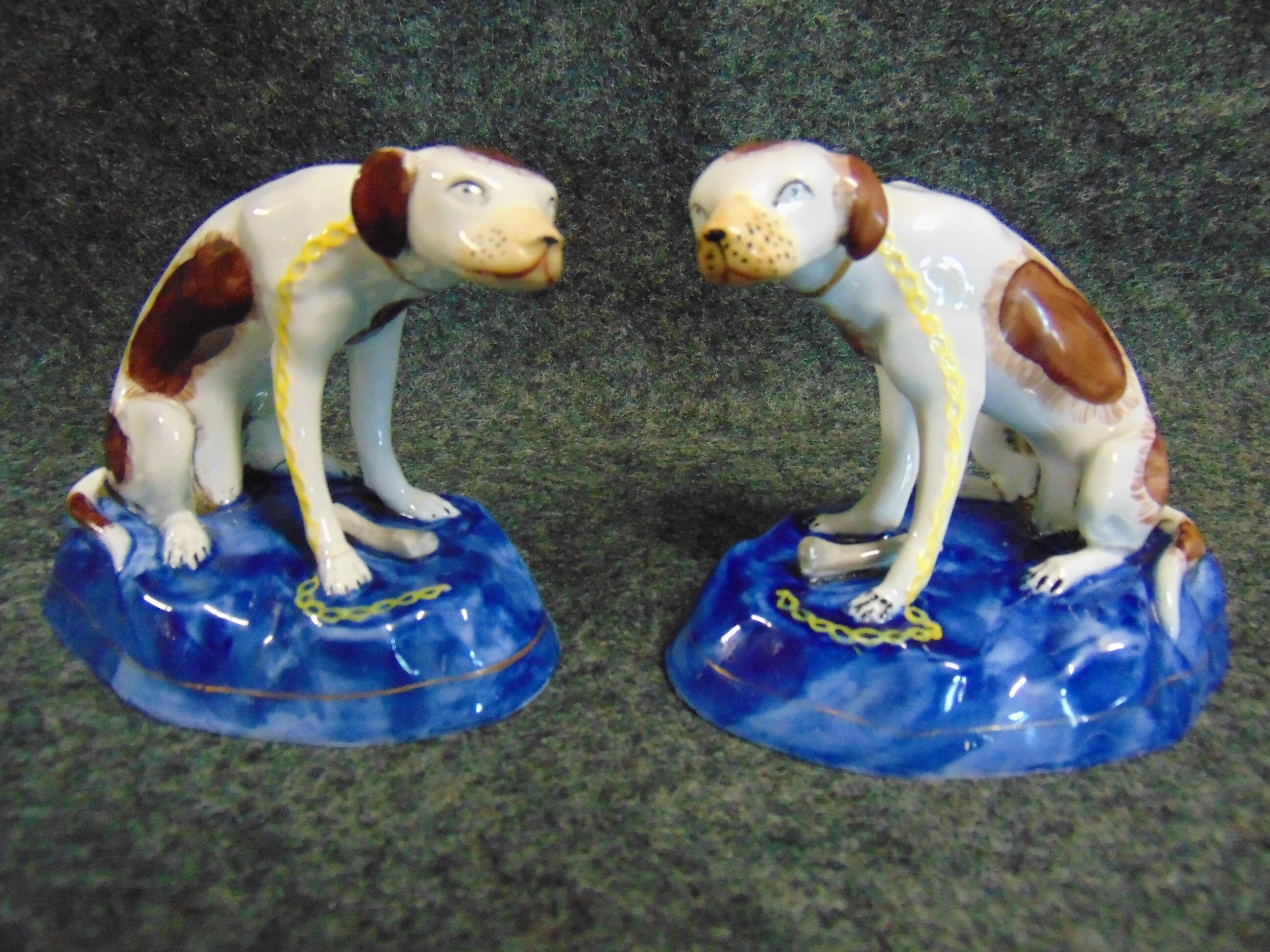 A Pair of Late 19th/early 20th Century Paris Porcelain Hunting Dogs