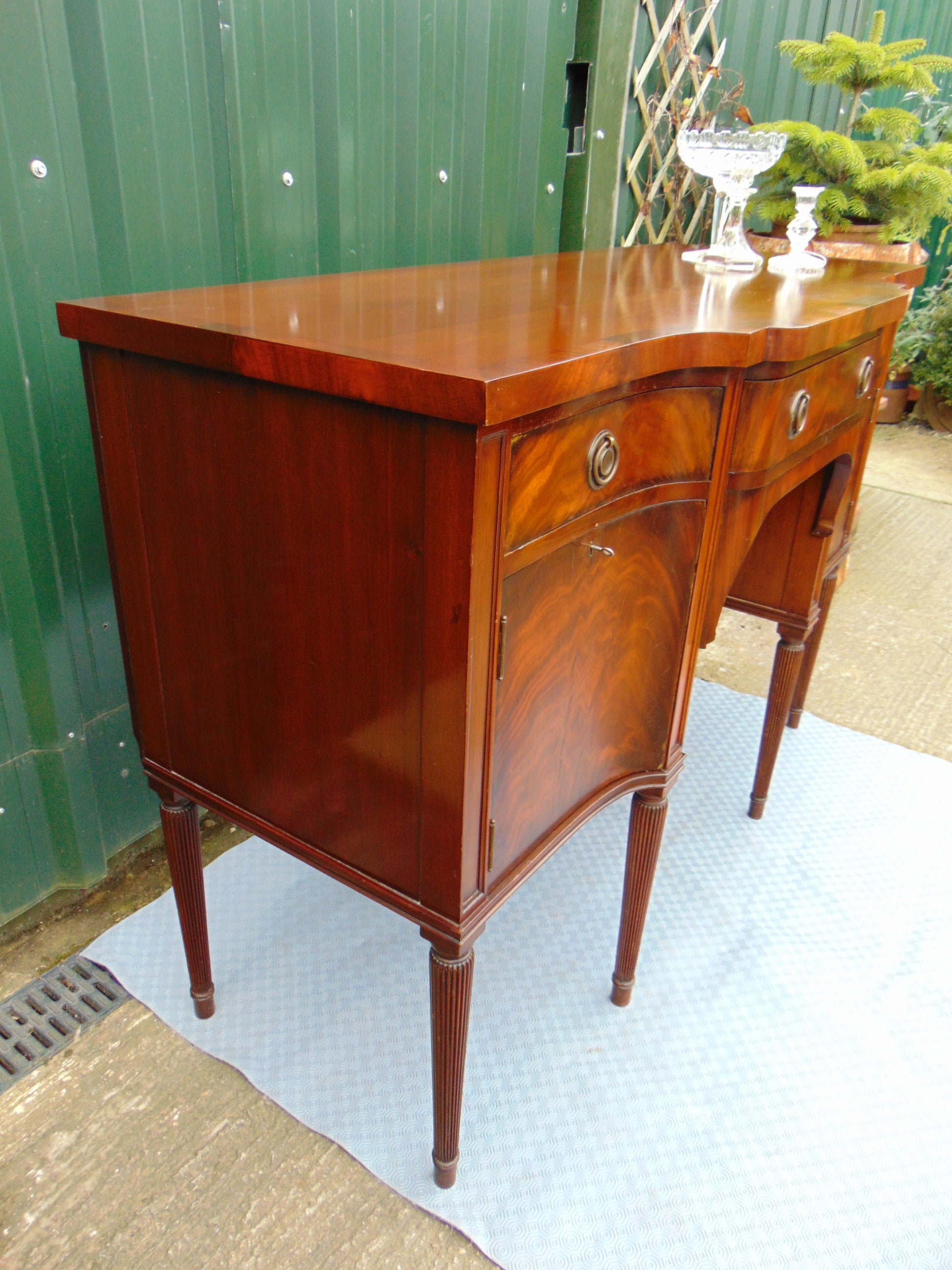 George III Style Crossbanded Mahogany Serpentine Front Sideboard