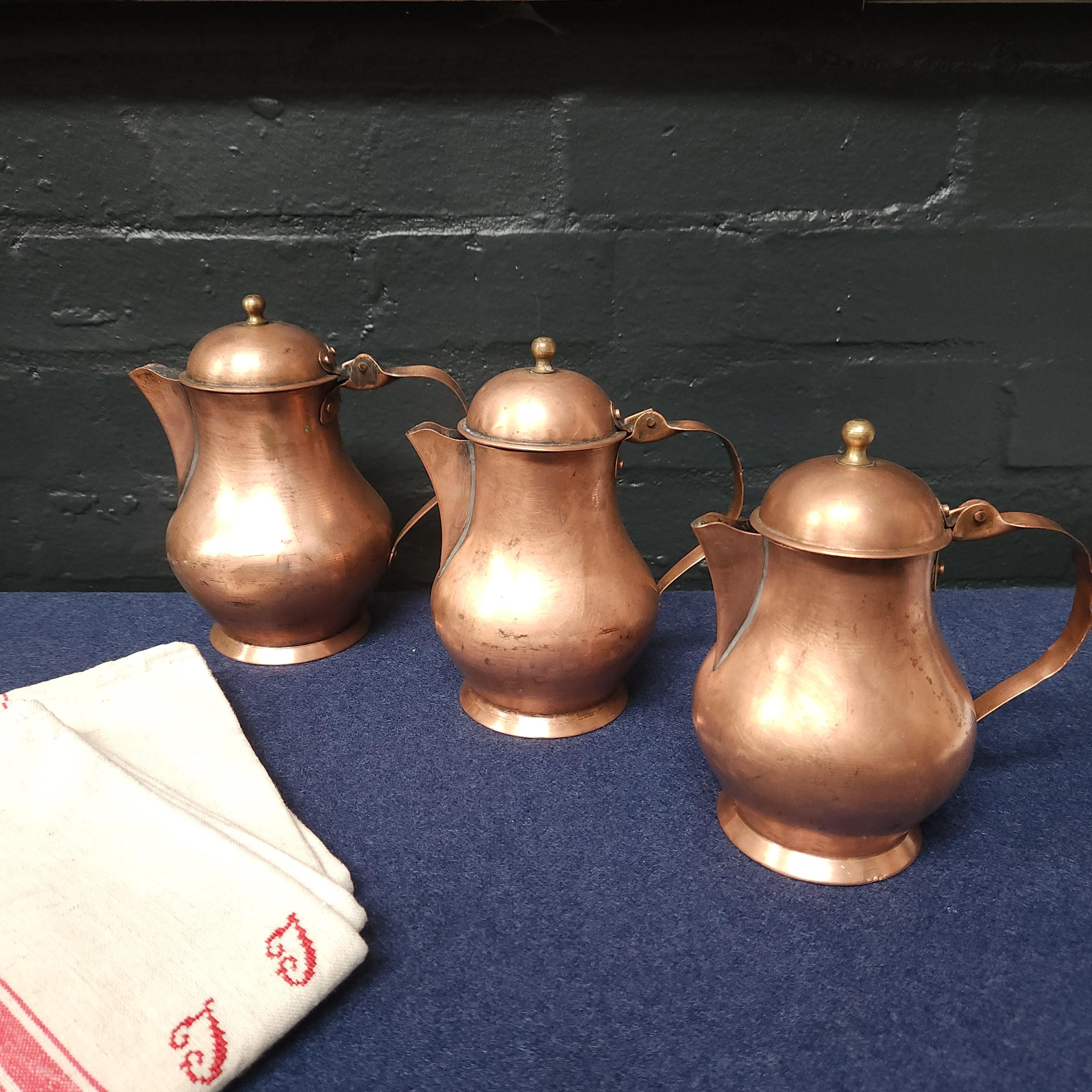 Set of 3 Copper Lidded Jugs