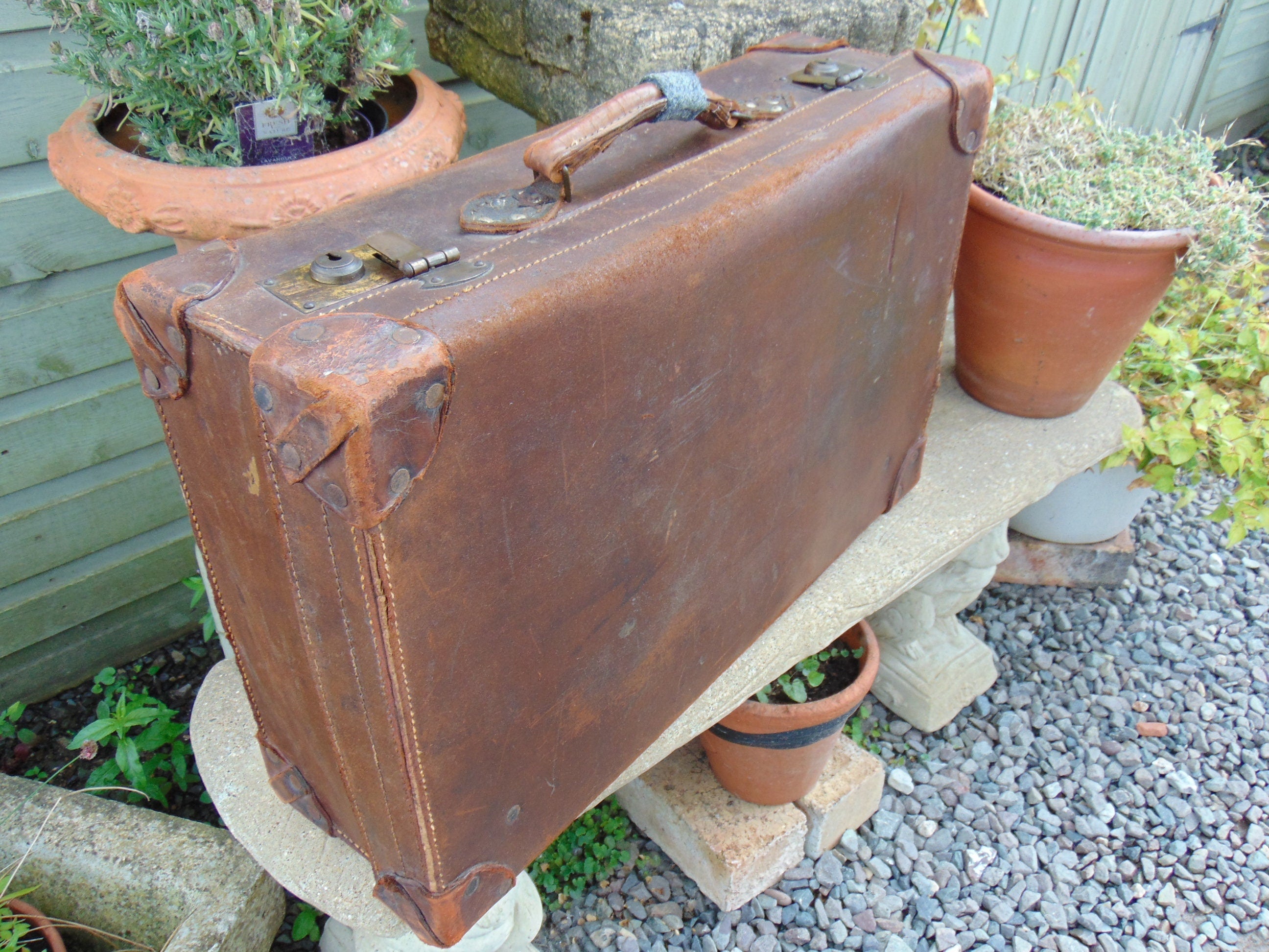 Early to Mid 20thC Tan leather Suitcase