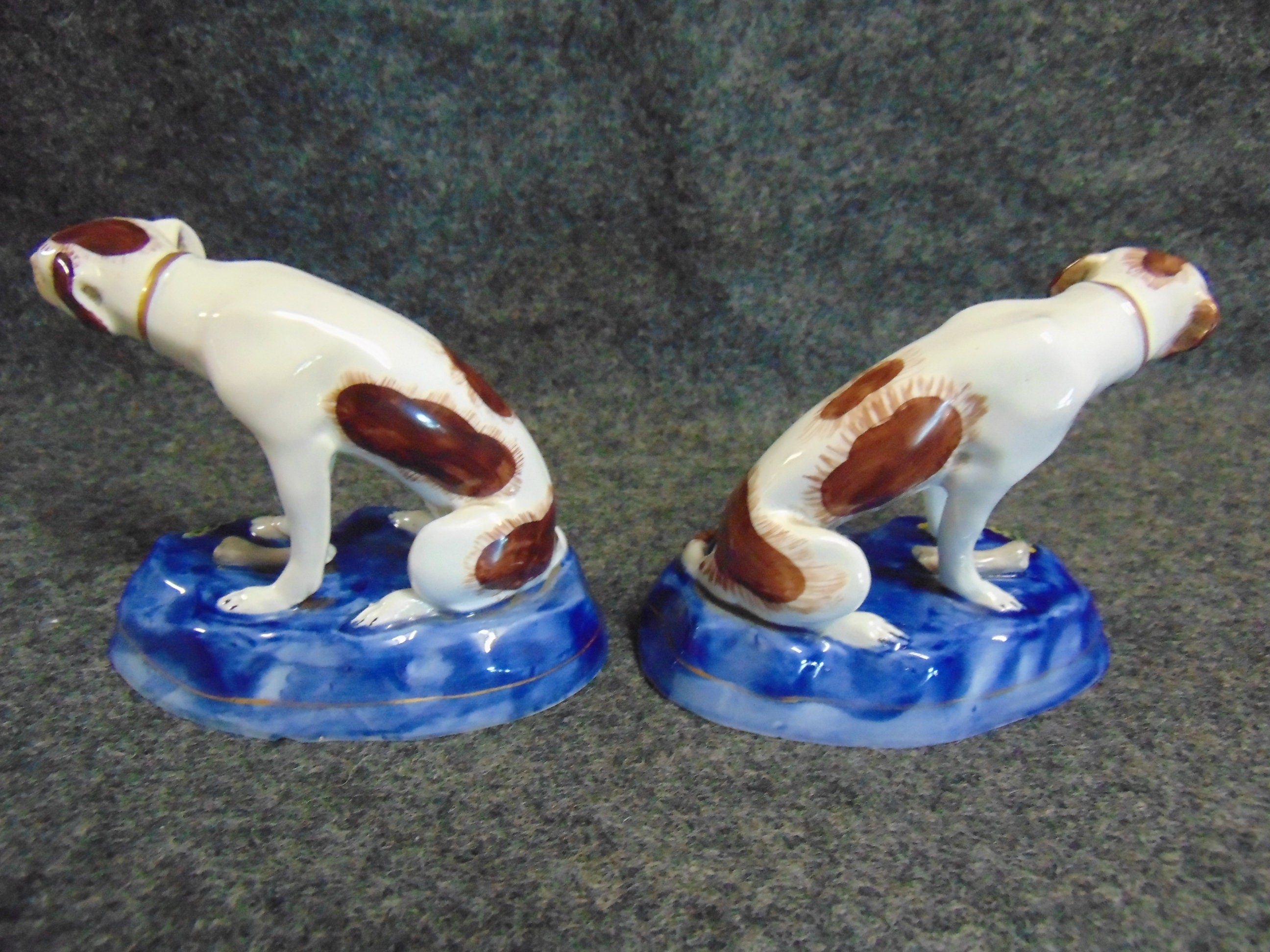 A Pair of Late 19th/early 20th Century Paris Porcelain Hunting Dogs