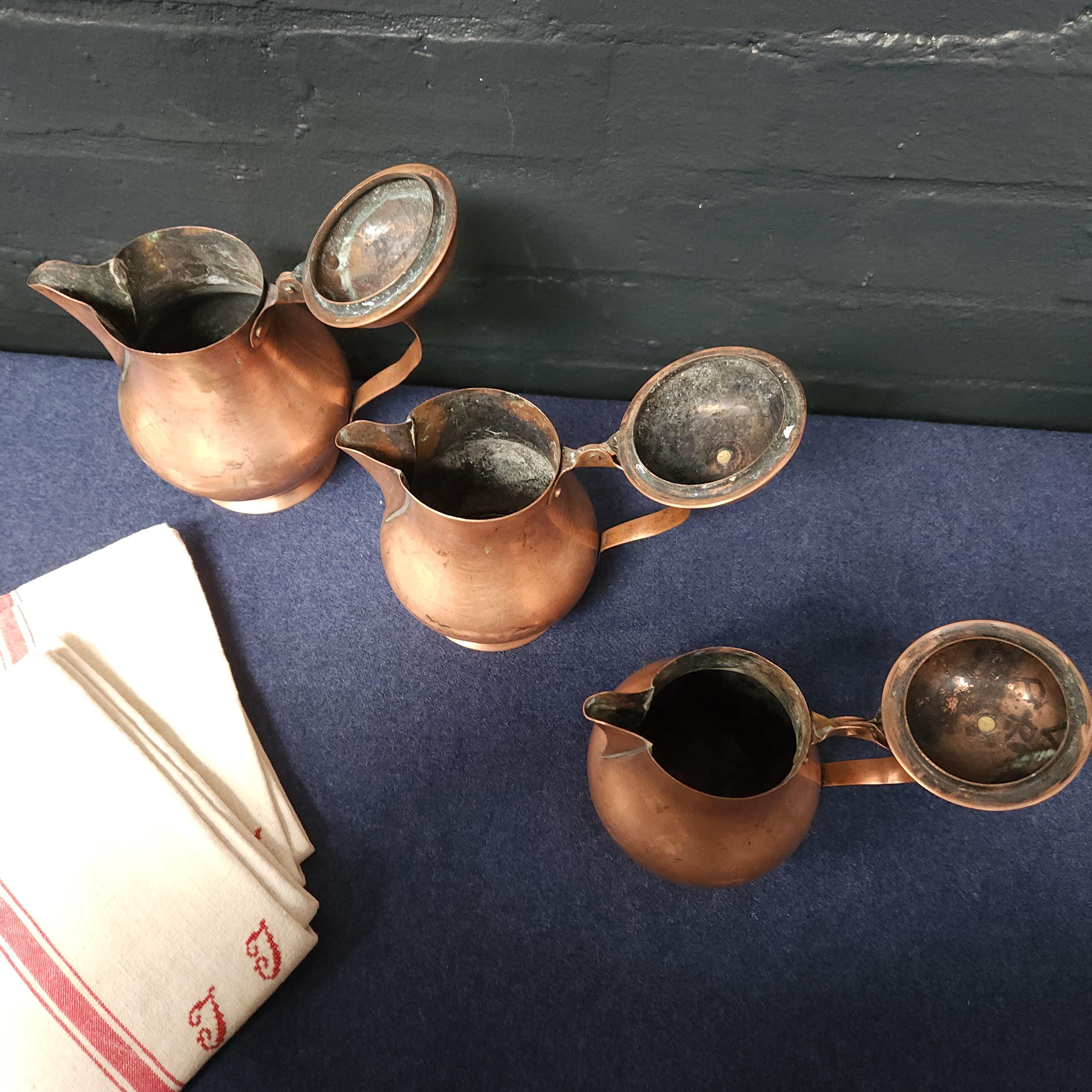 Set of 3 Copper Lidded Jugs