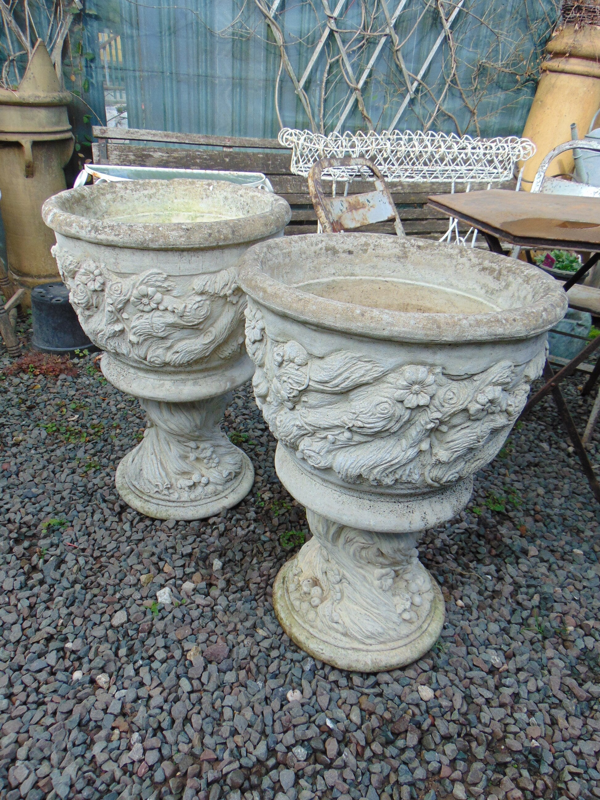 Pair Large Weathered Reconstituted Stone Urns Decorated with Flowers