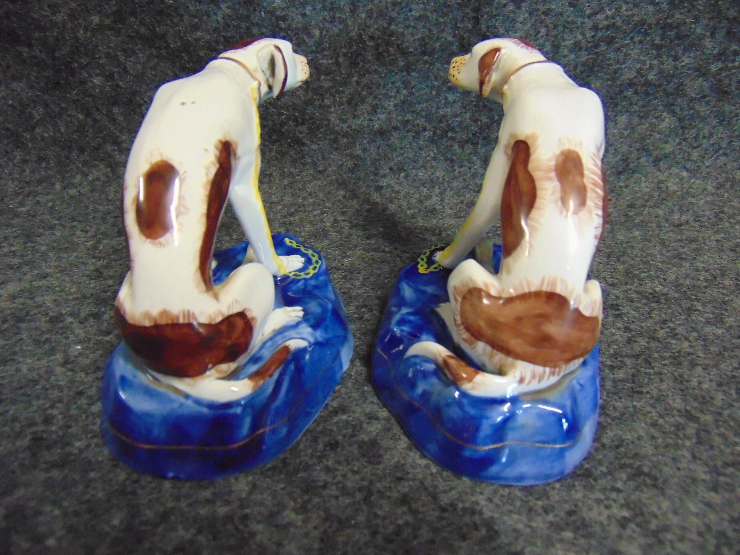 A Pair of Late 19th/early 20th Century Paris Porcelain Hunting Dogs