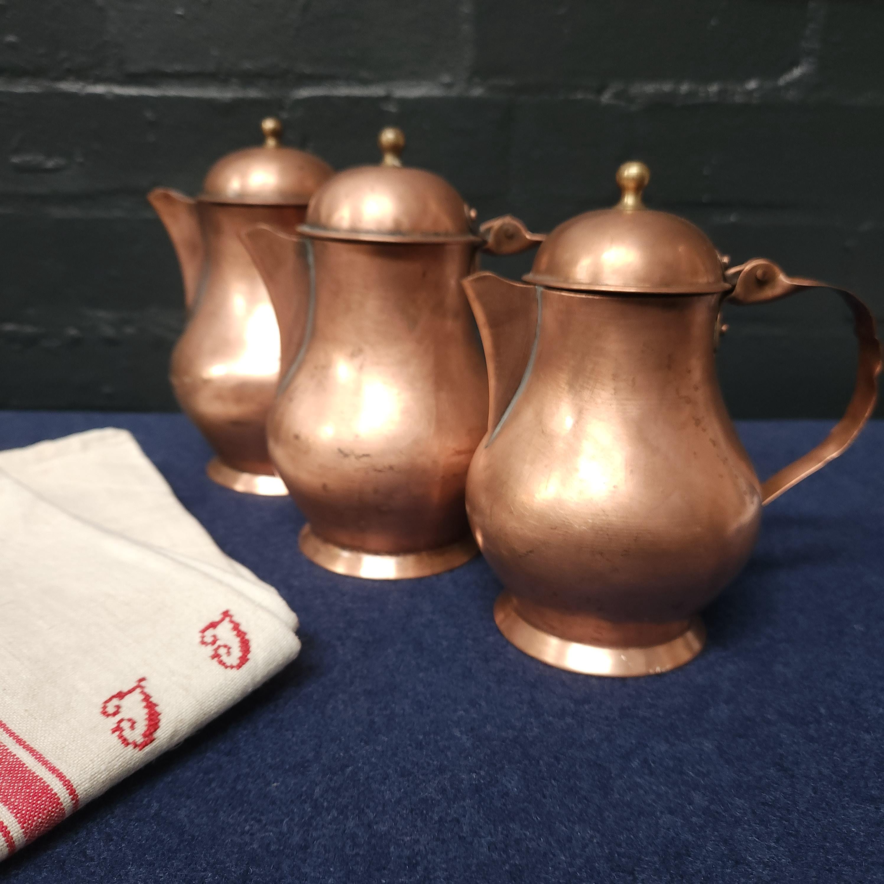 Set of 3 Copper Lidded Jugs