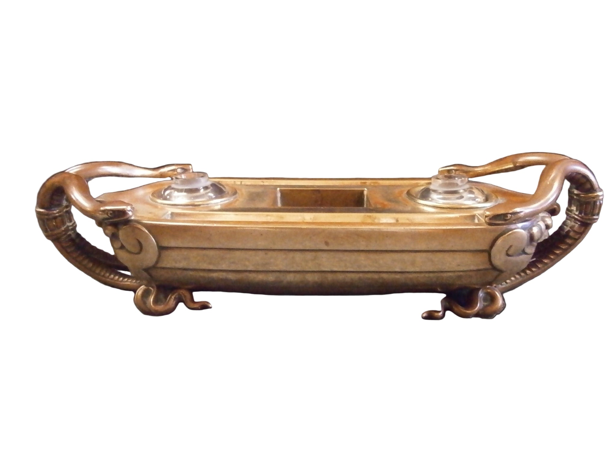 Decorative bronze box with glass lids on a dark background